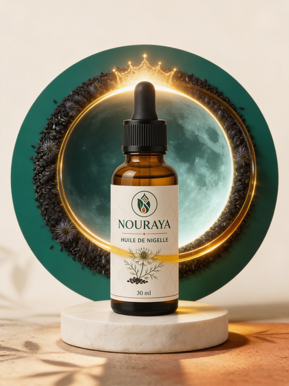 Flacon d'huile de nigelle NOURAYA sur socle de pierre, halo doré et graines noires
